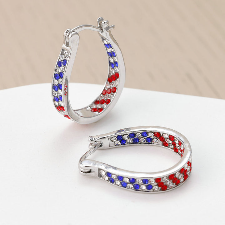 Ladies nano curved clip-on earrings with dense rhinestone embellishment and polished metal alloy Bowlift