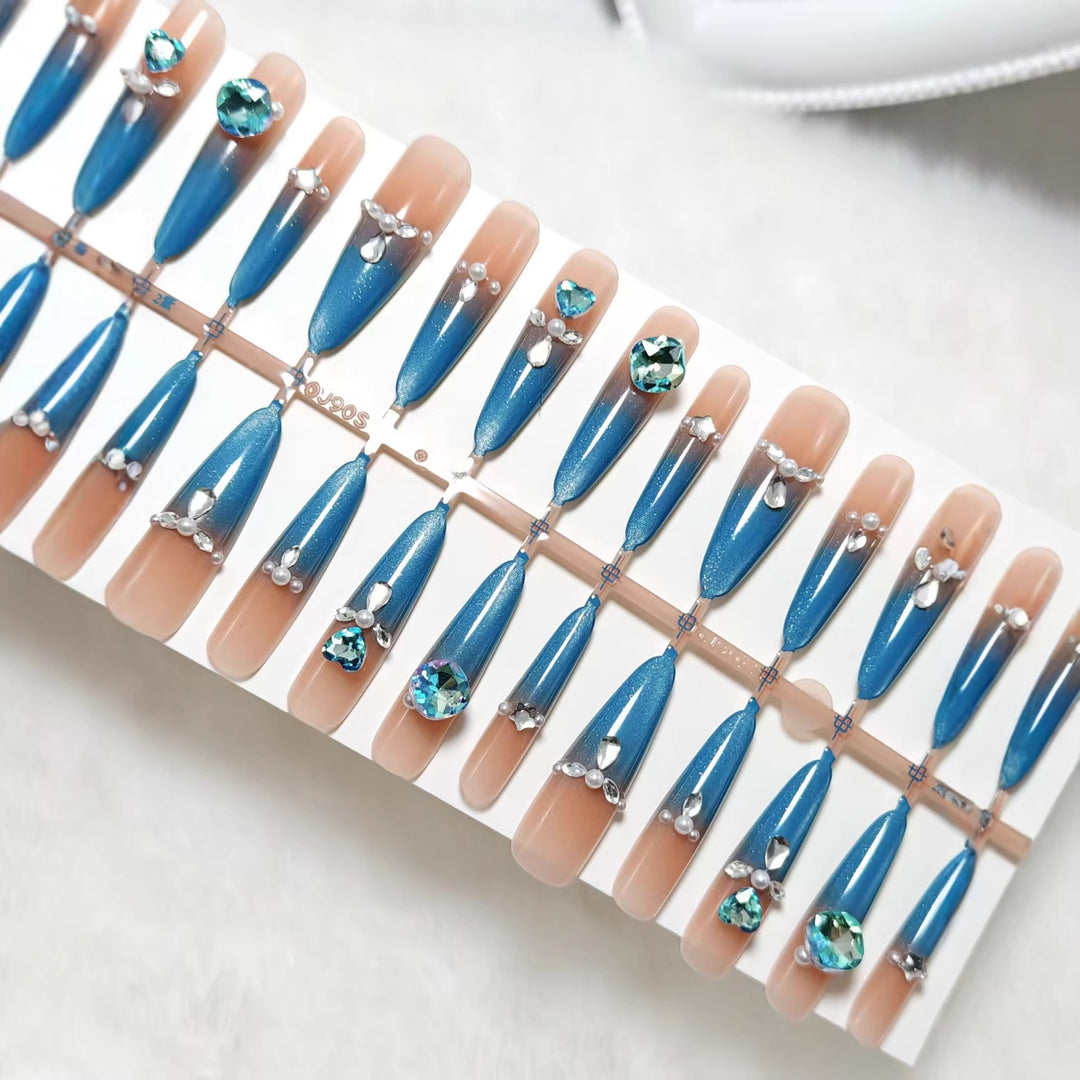 Glamorous artificial nails with sparkling rhinestone elements Bowlift