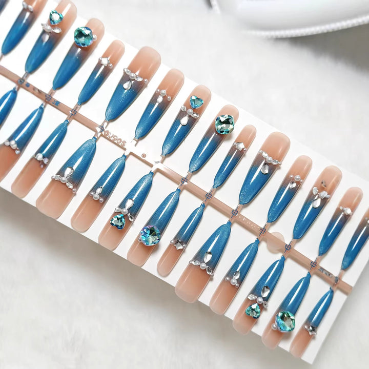 Glamorous artificial nails with sparkling rhinestone elements Bowlift