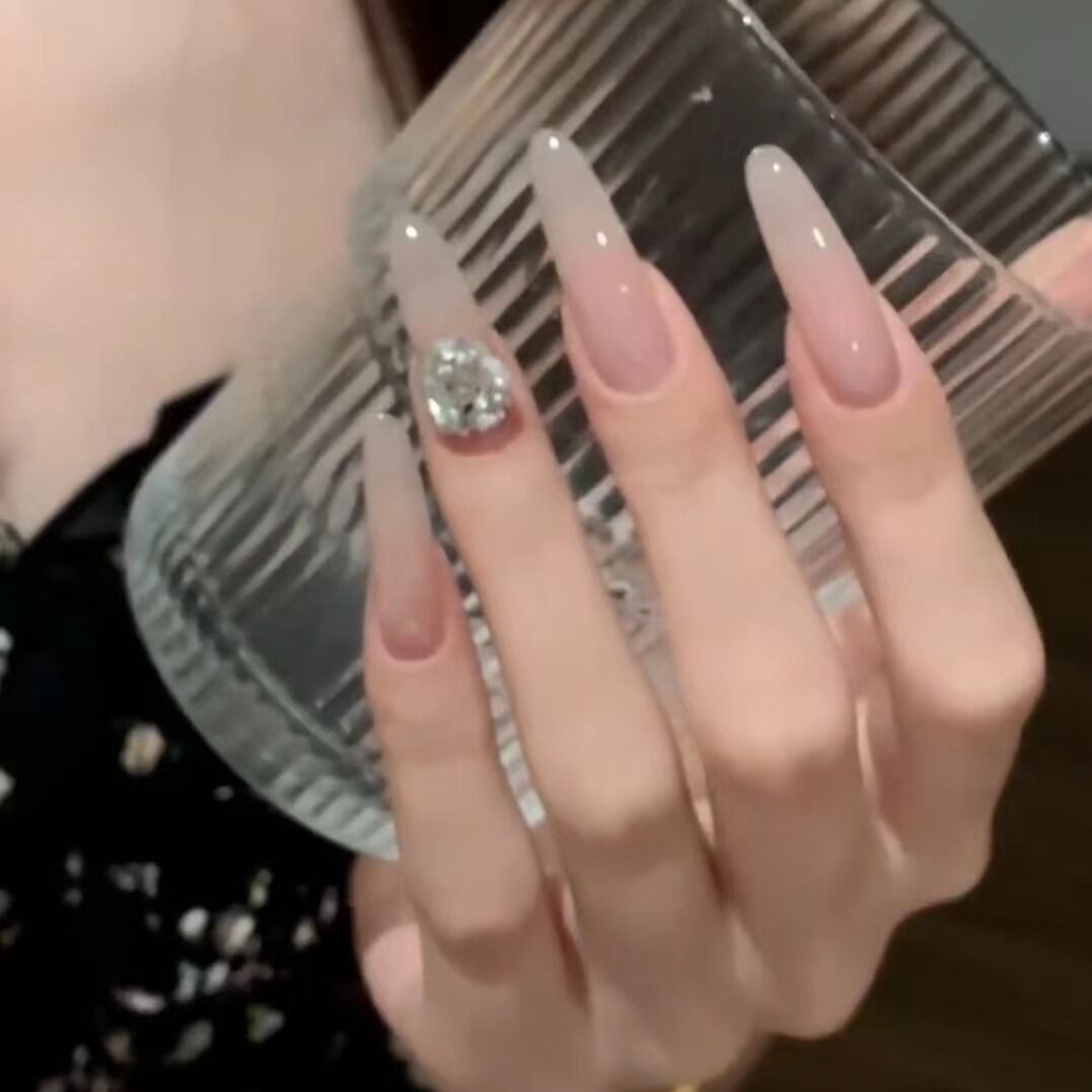 Decorative Press-On Nail Extensions with Floral Accents Bowlift