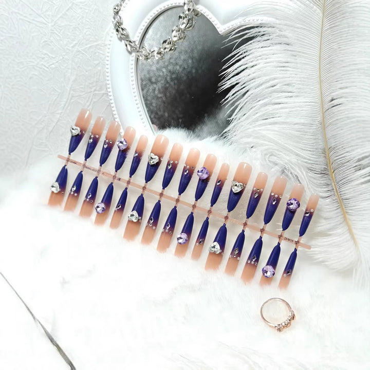 Artificial nails with elegant glitter design and 3D rhinestone accents Bowlift