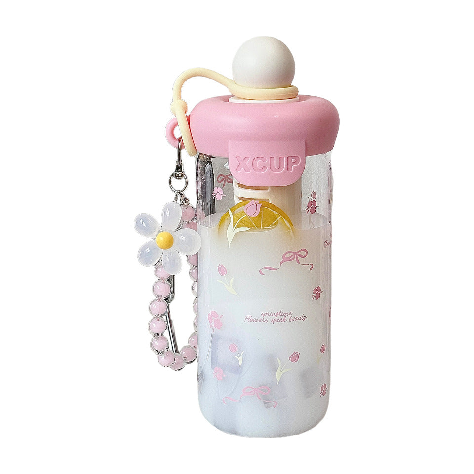 Women's bottle with integrated fruit infuser and Bowlift keychain
