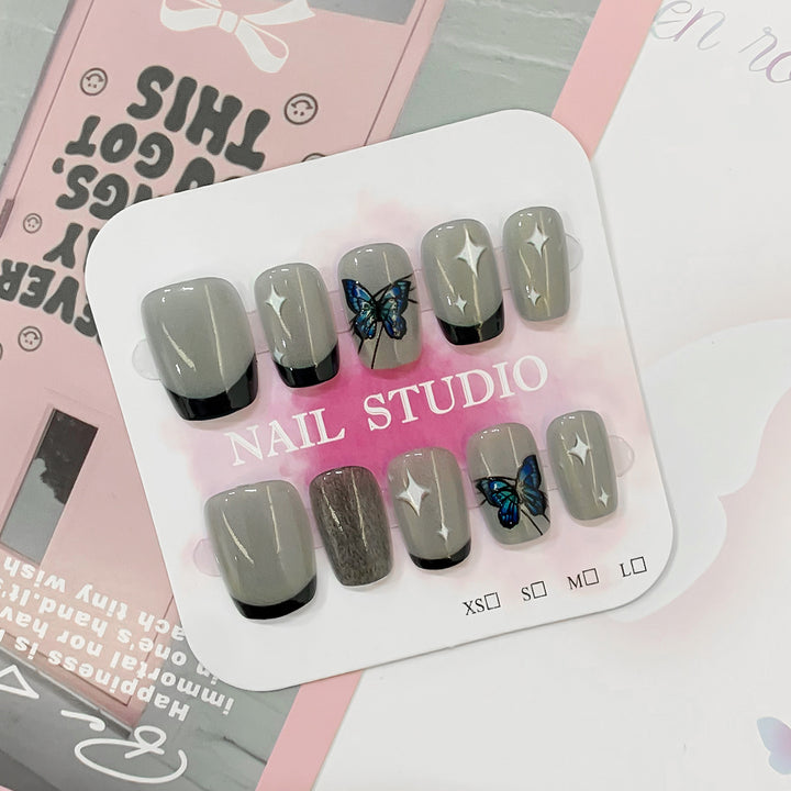 Artistic nail tips with butterfly designs Bowlift