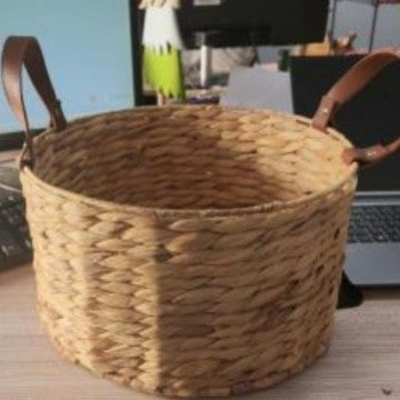 Braided storage basket with leather handles