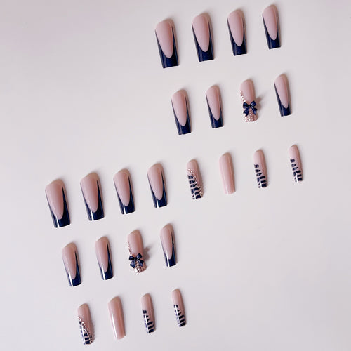 Artificial nail set with elegant tips and glamorous accents Bowlift