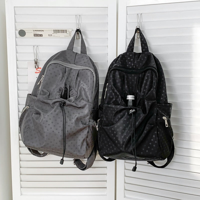 Leisure backpack with functional folding technique and multiple outer pockets Bowlift