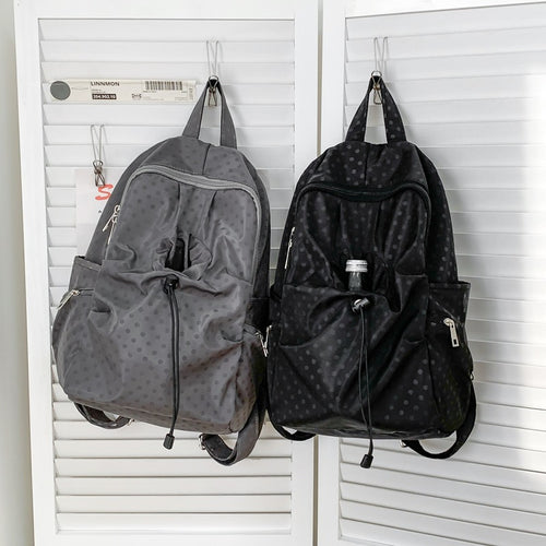 Leisure backpack with functional folding technique and multiple outer pockets Bowlift
