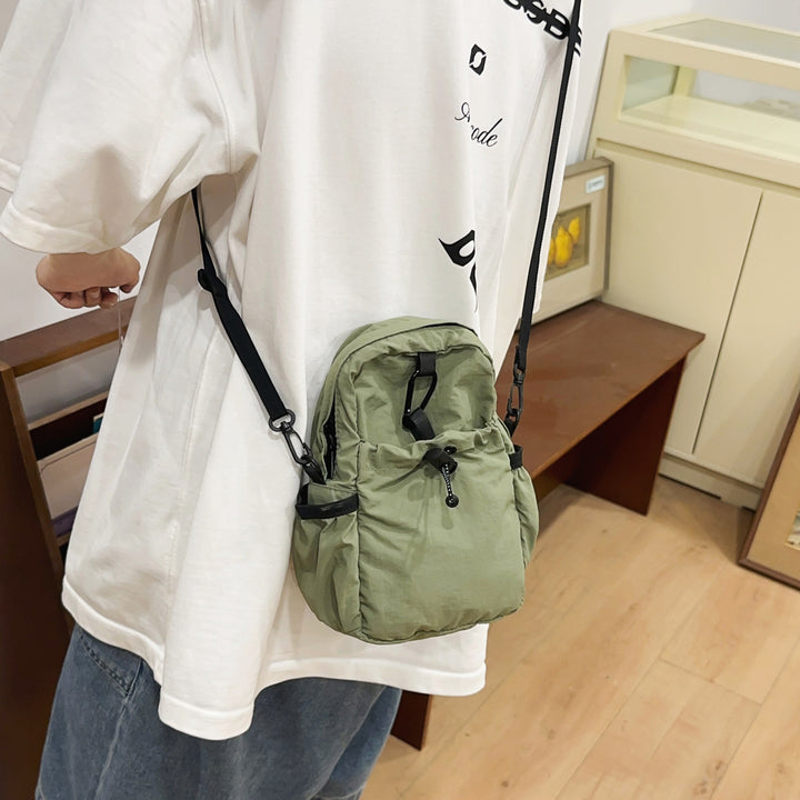Practical crossbody backpack with multifunctional compartments Bowlift