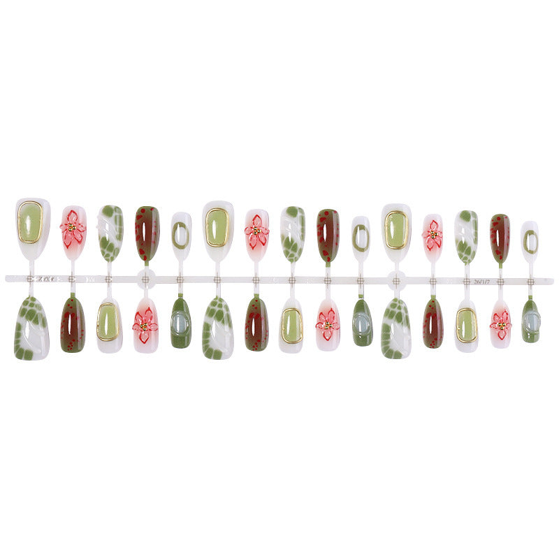 Nail art set with elegant floral and golden accents Bowlift
