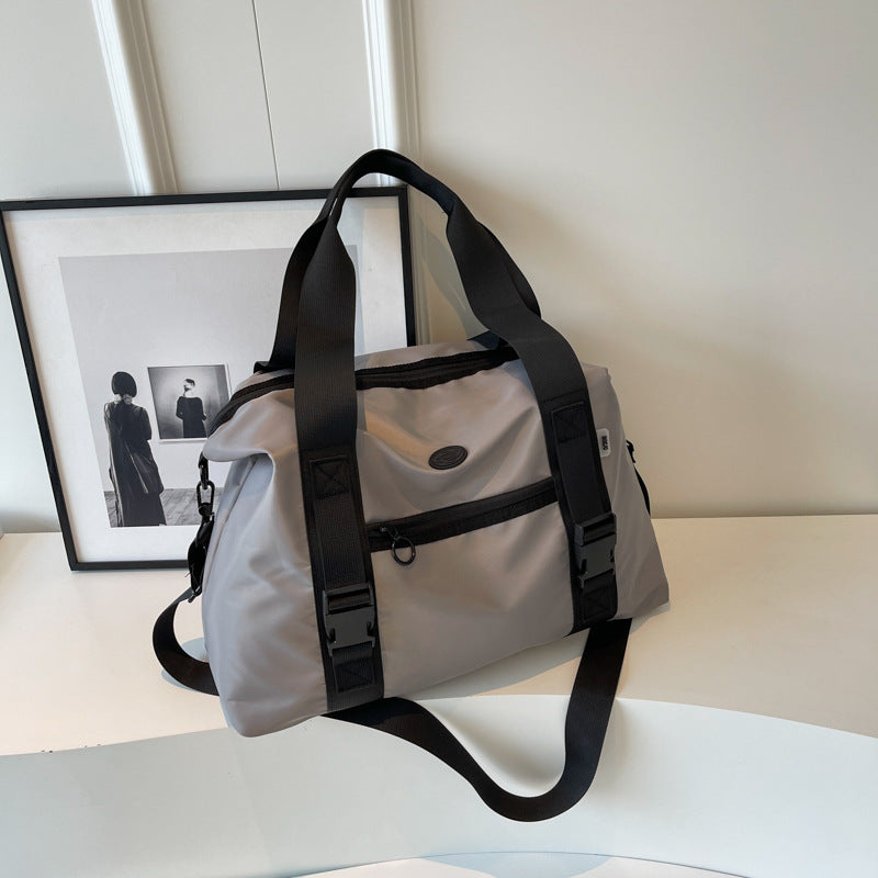Spacious sports duffel bag with ergonomic carrying handles and water-repellent material Bowlift