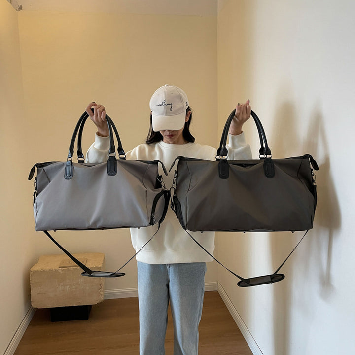 Elegantly Designed Travel Bag with Multifunctional Interior Compartments Bowlift
