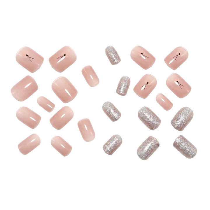 Artificial nails with sparkling accents and floral design Bowlift