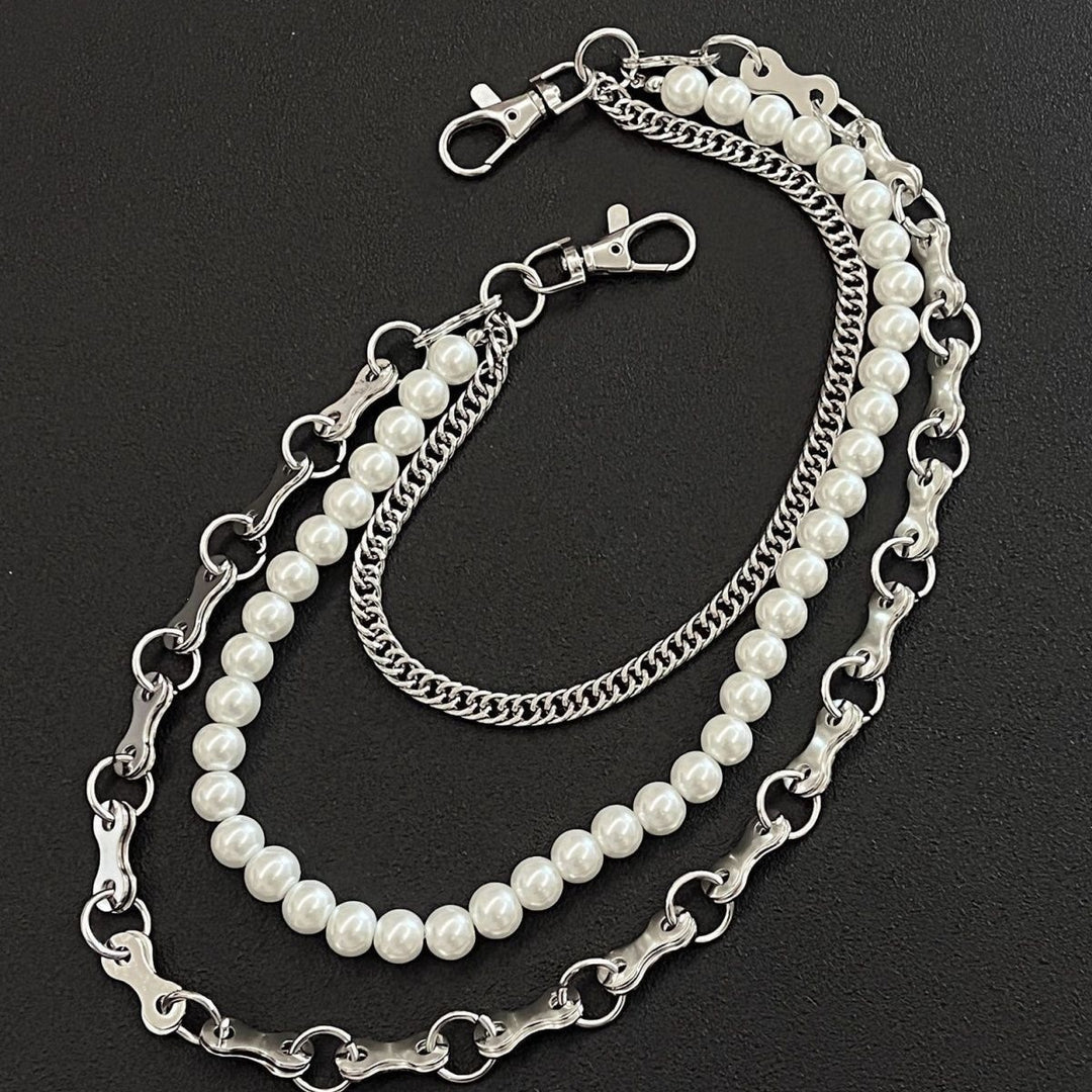 Fashionable chain bracelet with pearls and metal links Bowlift