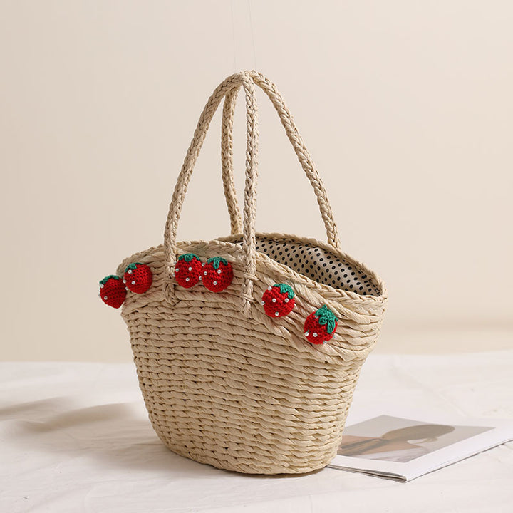 Handmade basket bag with playful strawberry motif Bowlift