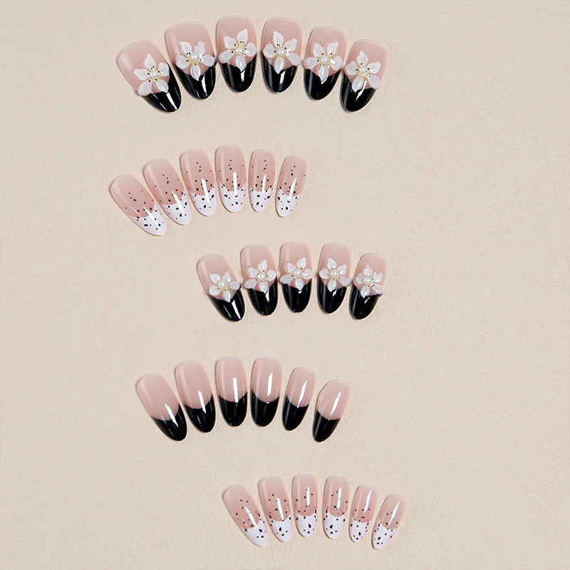 Artful nail tips with floral embellishments Bowlift