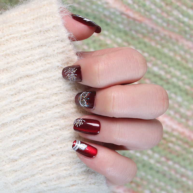 Artistic Holiday-Themed Press-On Nail Design Bowlift