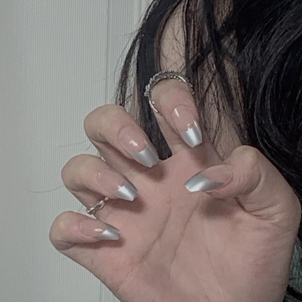 Artificial stiletto nails with glitter accents and elegant French tip Bowlift