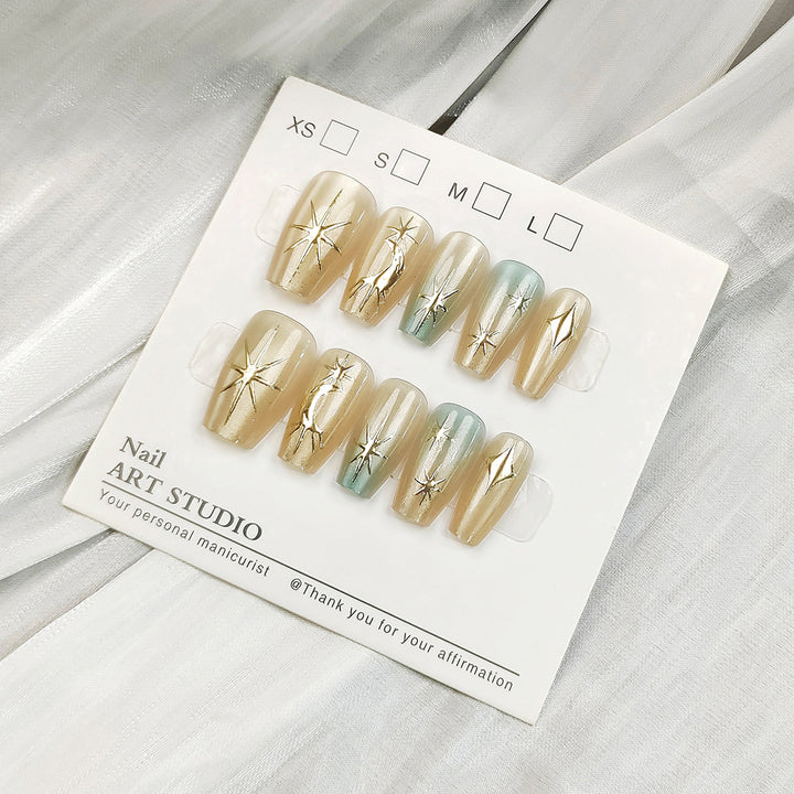 Artificial nail tips with shimmering design Bowlift