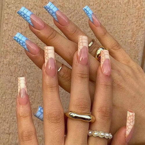 Artificial nail extensions with modern designs and creative color accents Bowlift