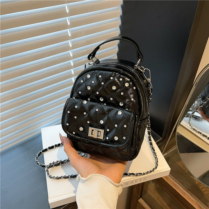 Quilted Mini Backpack with Rhinestone Accents Bowlift