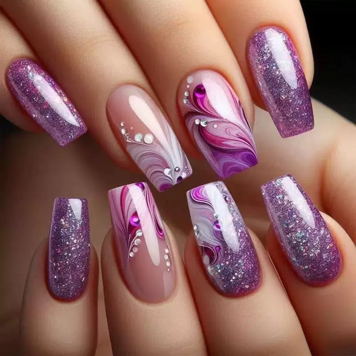 Acrylic nail set with luxurious color gradients and sparkling accents Bowlift
