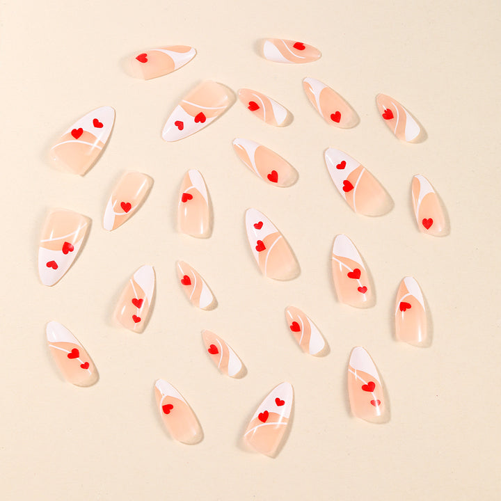 Heart-Embellished Stiletto Nail Art Bowlift
