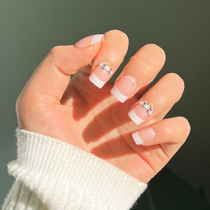 Artful Nail Extensions with Elegant Jewelry Accents Bowlift