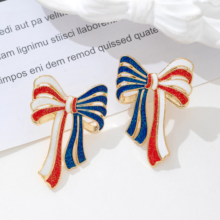 Ladies' elegant enamel bow earrings with glitter effect and gilded setting Bowlift