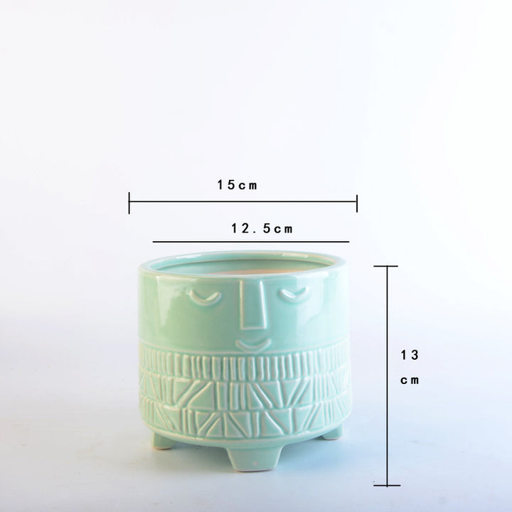Decorative plant pot with facial features Bowlift
