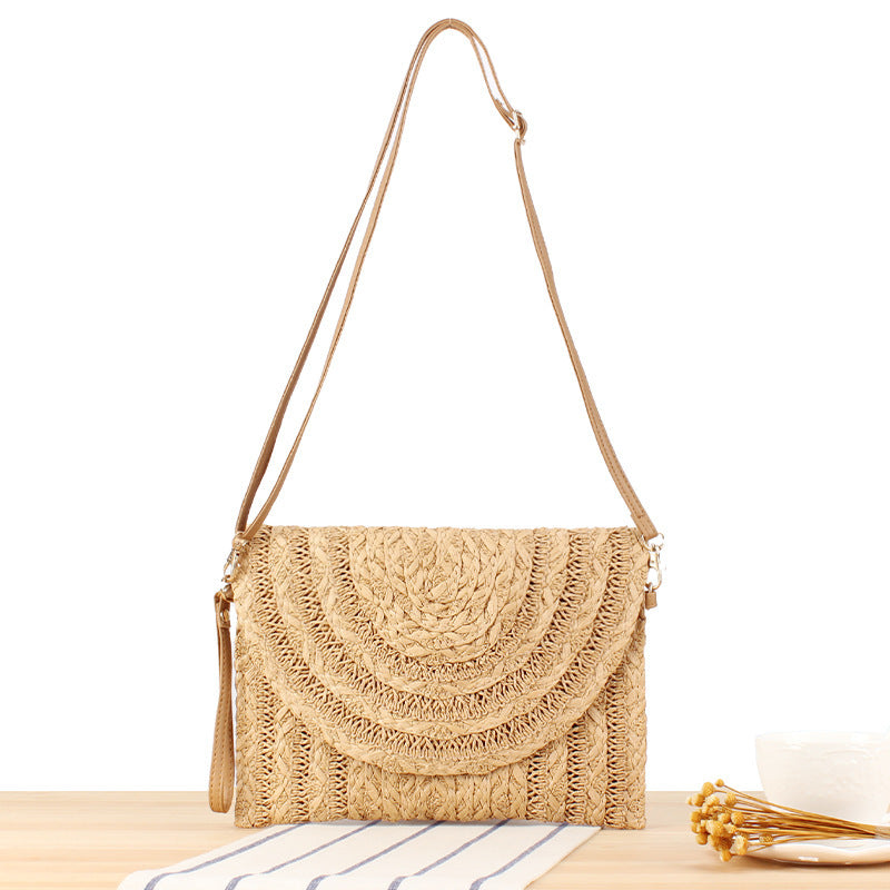 Shoulder bag made of high-quality woven natural material with elegant wave pattern Bowlift