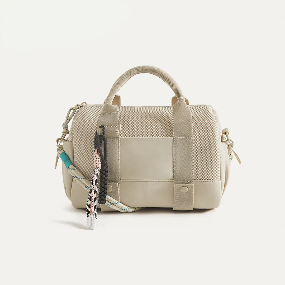 Practical sports bag with mesh structure and removable shoulder strap Bowlift