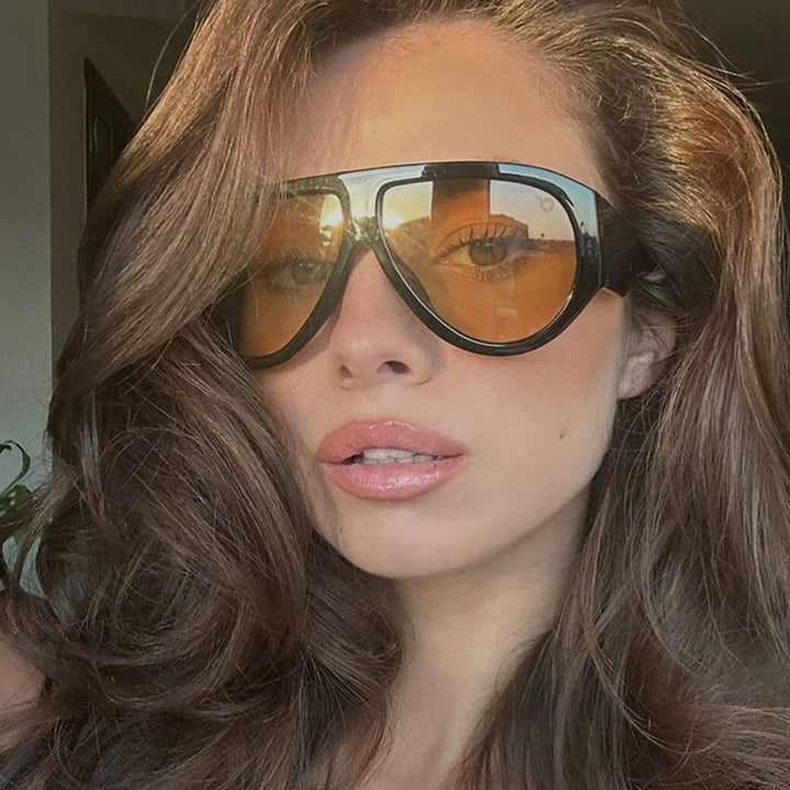 Ladies fashionable sunglasses in modern design with wide frame Bowlift