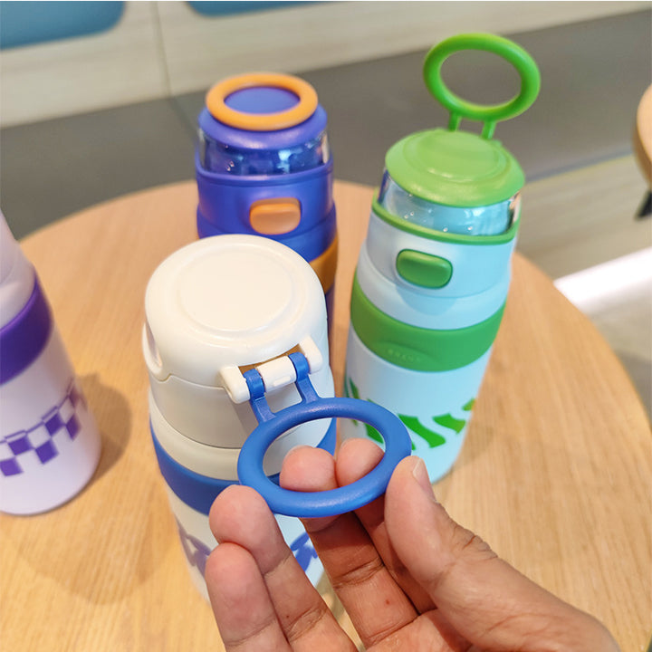 Women's BPA-free water bottle with innovative safety closure Bowlift