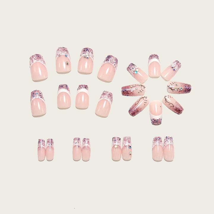 Glamorous artificial nails with glitter and rhinestone embellishments Bowlift
