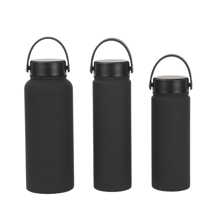 Women's double-walled insulated water bottle with practical carrying handle Bowlift