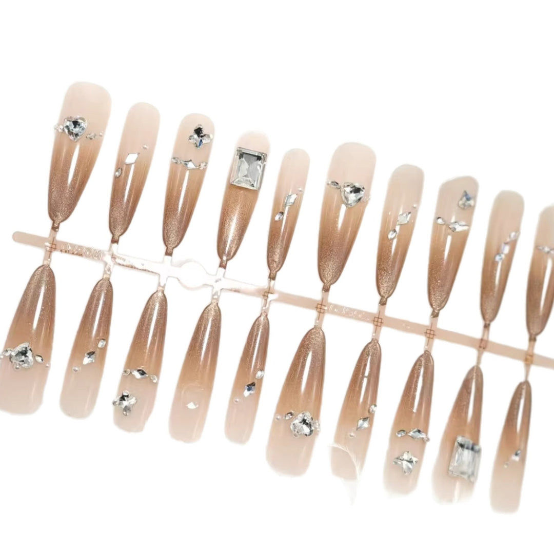 Artificial nails with sparkling rhinestone decorations Bowlift