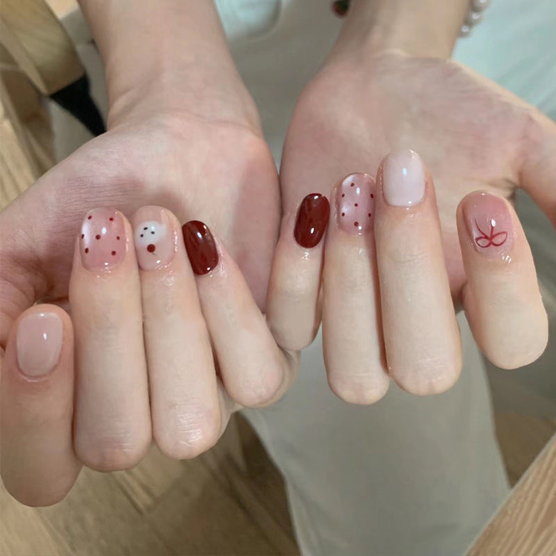 Glamorous Press-On Nail Set with Decorative Gemstone Accents Bowlift