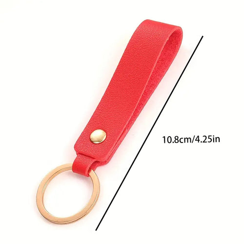 Unisex keychain made of high-quality synthetic leather with elegant metal embellishment Bowlift