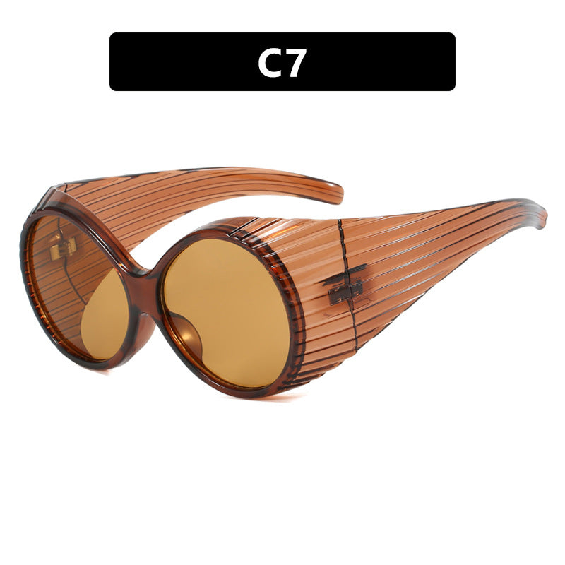 Women's extravagant sunglasses with curved frame Bowlift