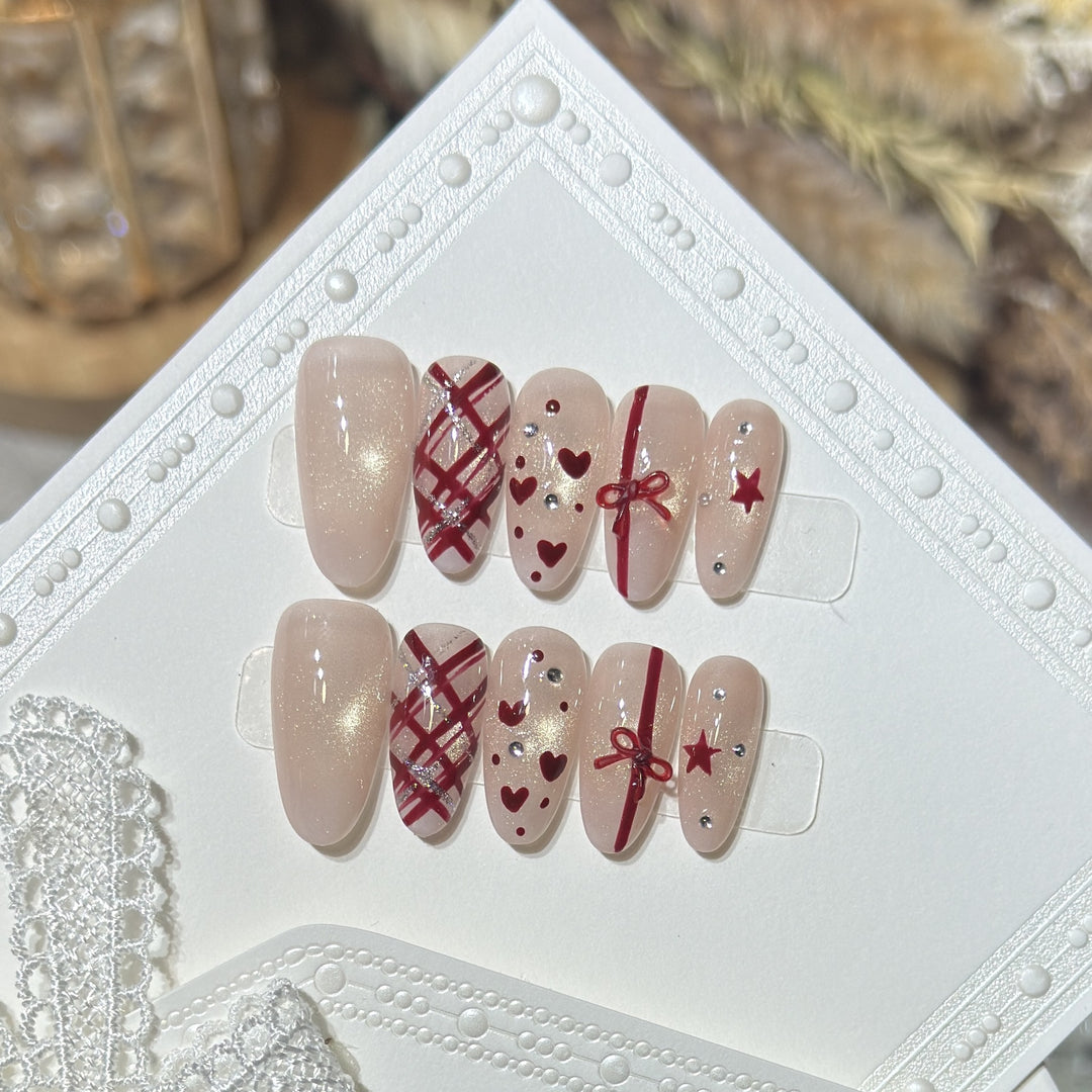 Romantic Themed Press-On Nail Set with Heart and Bow Accents Bowlift