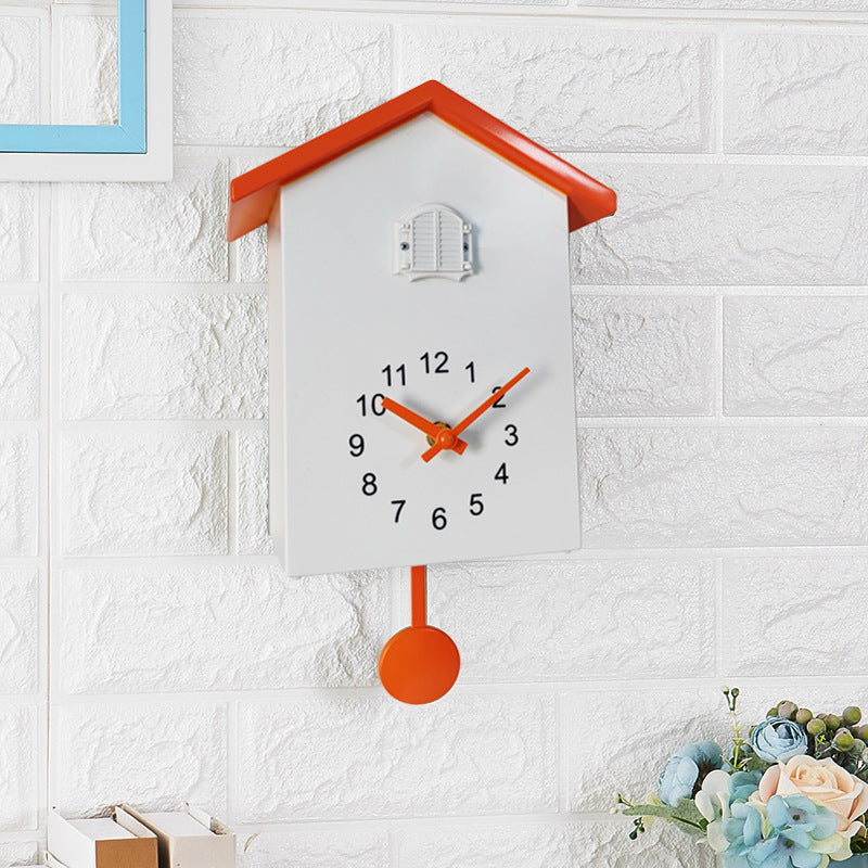 Cuckoo clock in creative house design Bowlift