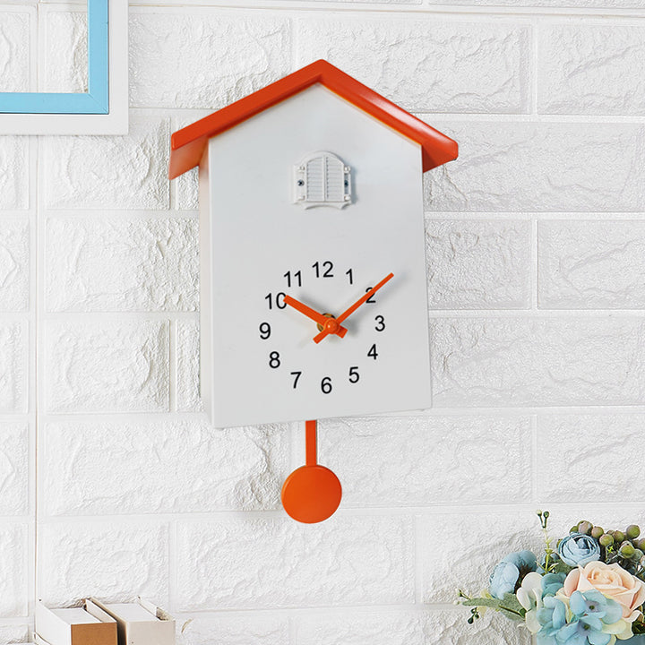 Cuckoo clock in creative house design Bowlift