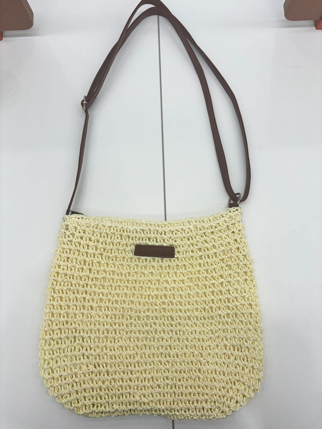 Handwoven shoulder bag with brown leather accent Bowlift