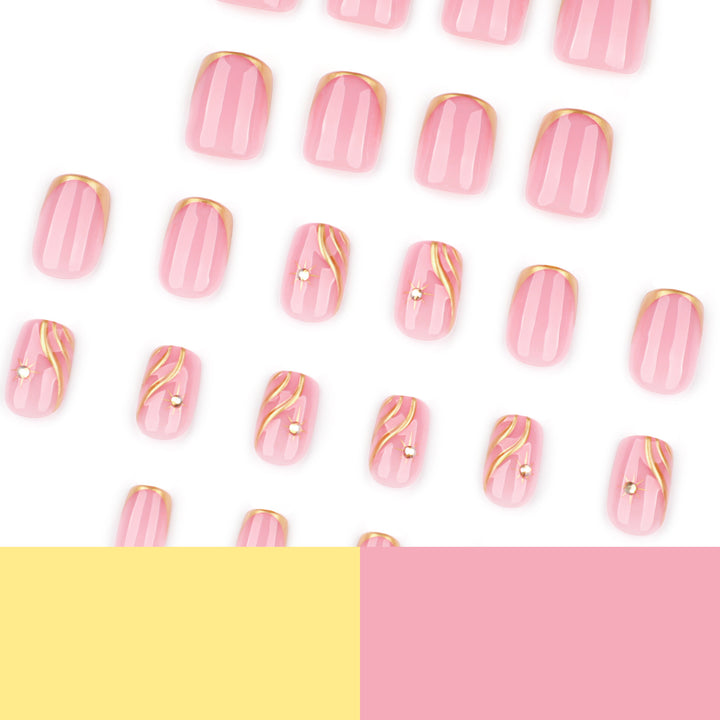 Artificial nail art with glamorous golden accents Bowlift