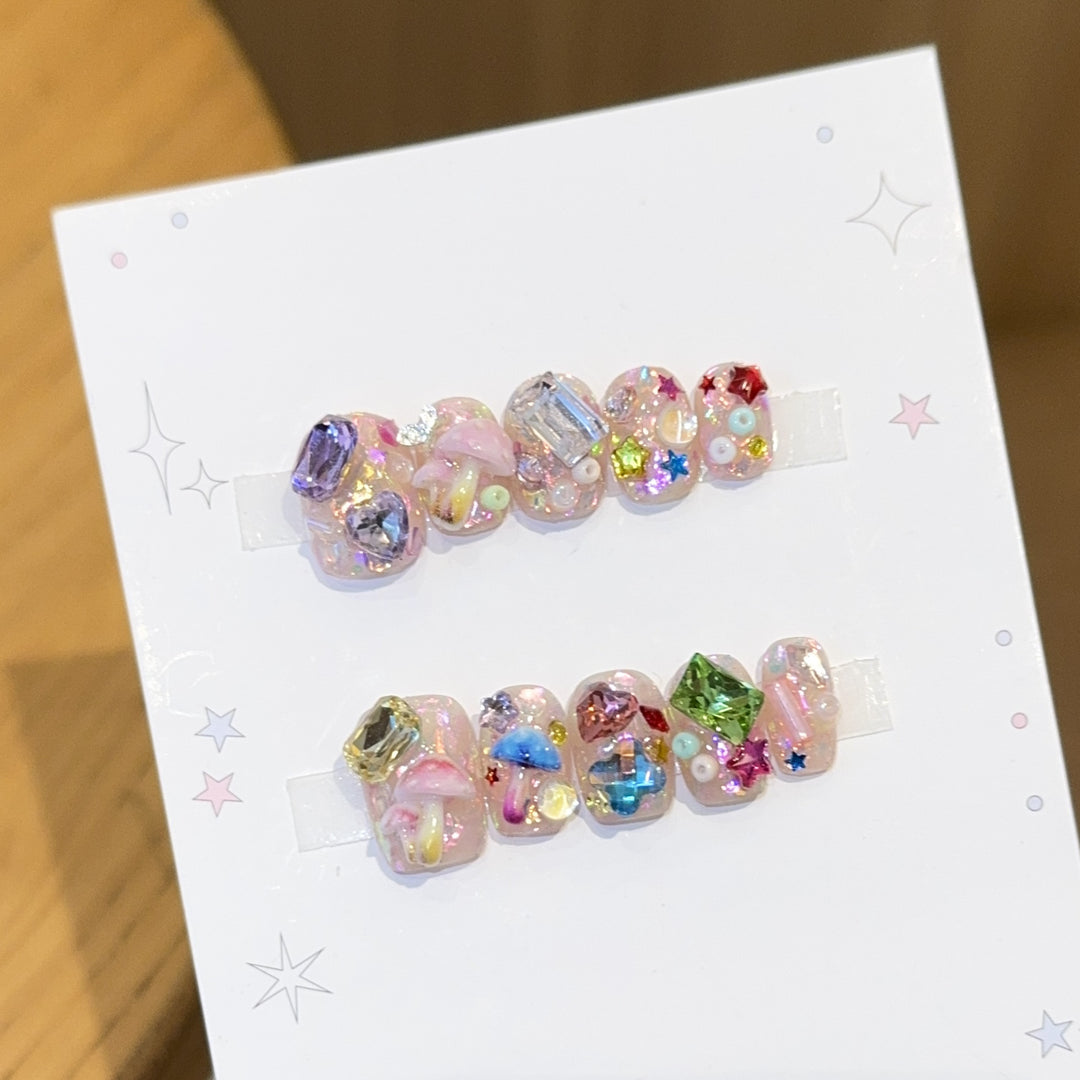 Artificial nails with sparkling crystal accents Bowlift