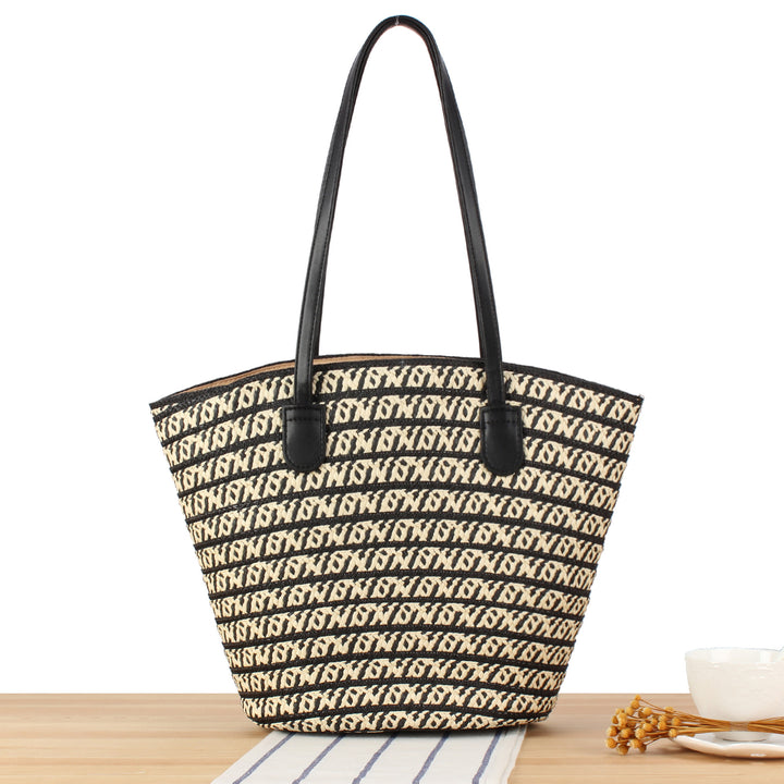 Designer straw bag with contrasting pattern and elegant leather handles Bowlift