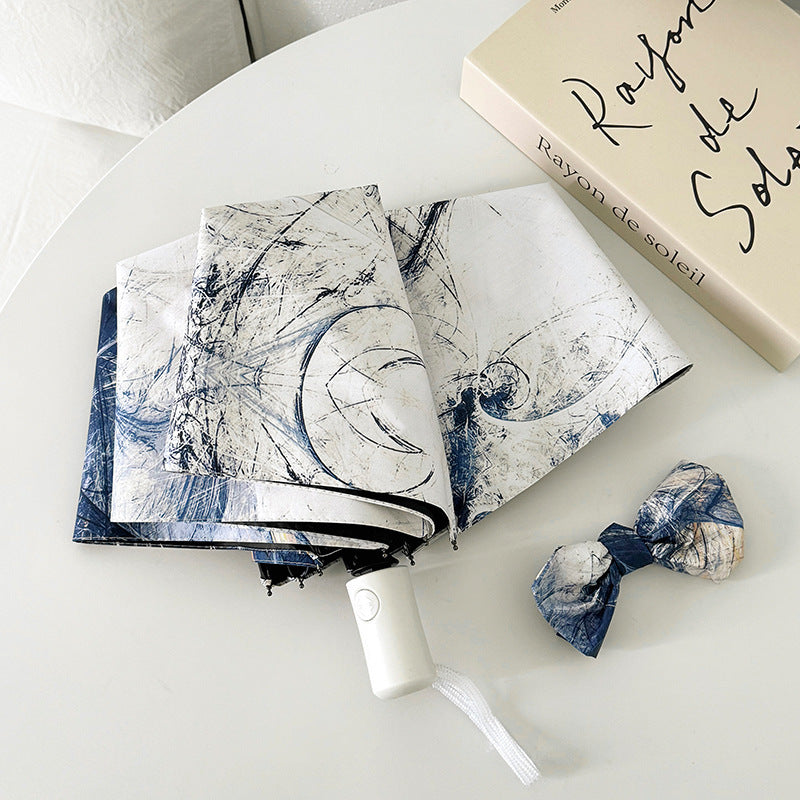 Ladies elegant folding umbrella with unique marble pattern Bowlift