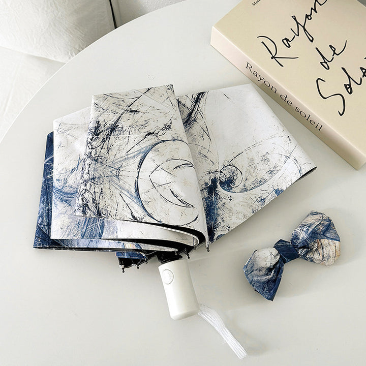Ladies elegant folding umbrella with unique marble pattern Bowlift