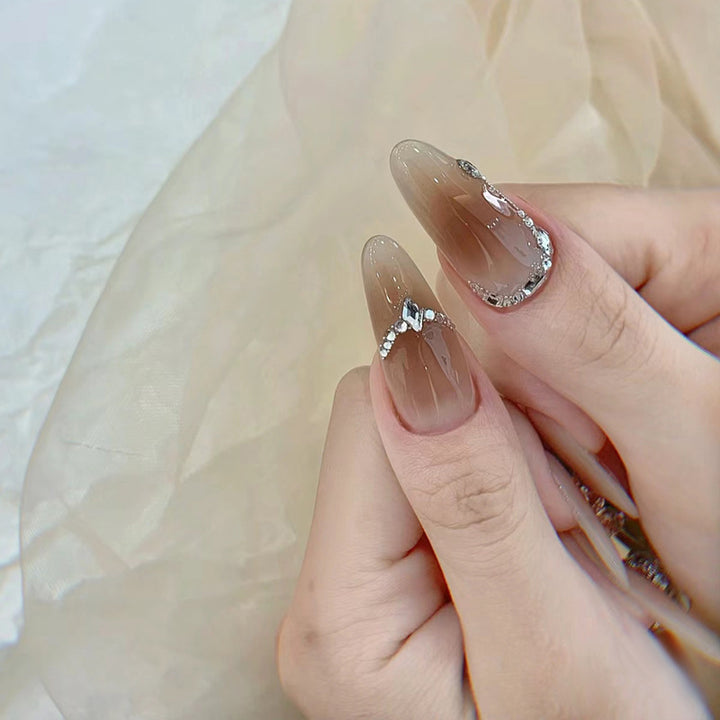 Elegant Press-On Nails with Crystal Accents Bowlift