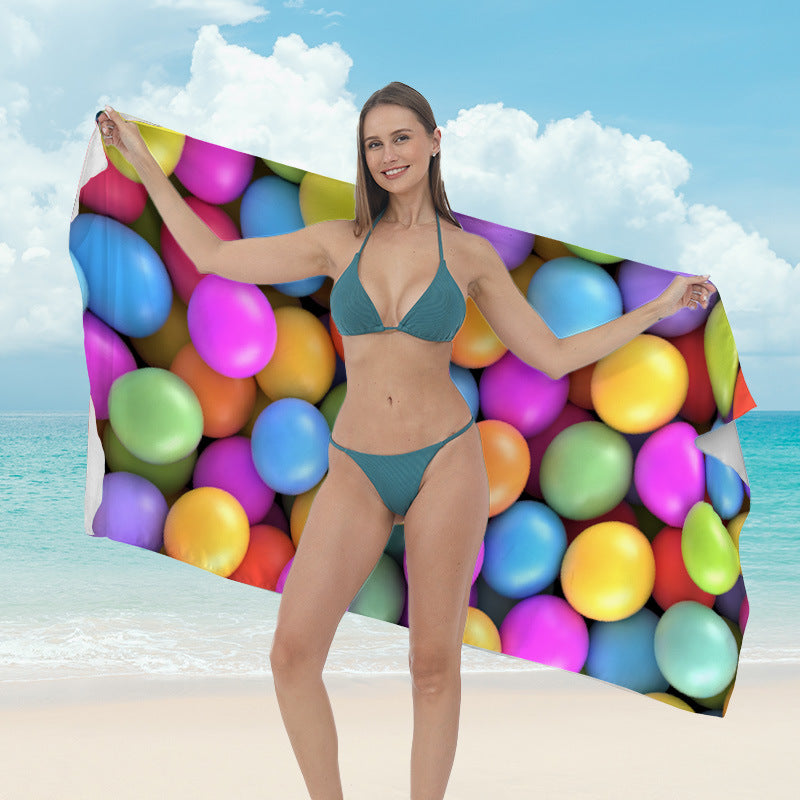 Beach towel with vibrant tropical plant motif Bowlift